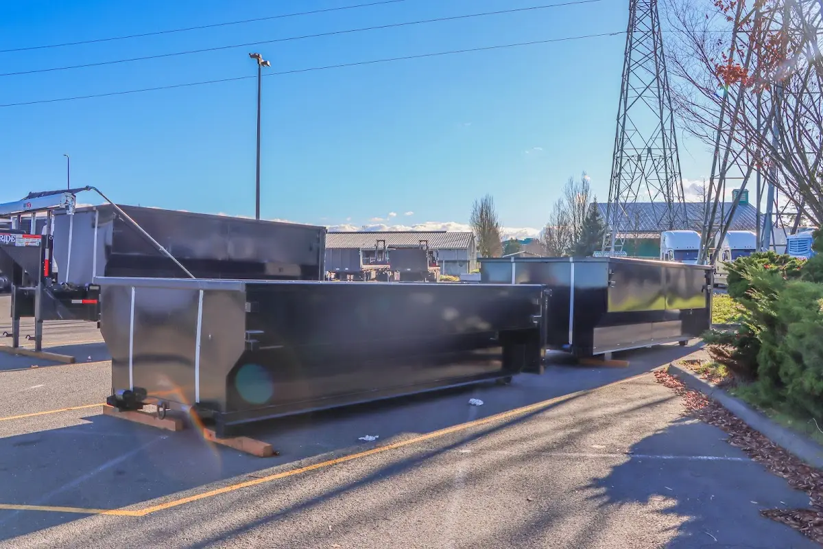 Roll-off dumpster ready for waste disposal at job site for 12 Yard Dumpster Rental in Runnemede